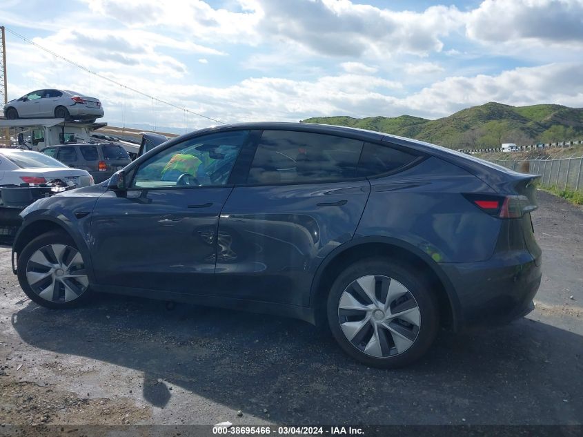 2023 Tesla Model Y Awd/Long Range Dual Motor All-Wheel Drive VIN: 7SAYGDEE5PF913765 Lot: 38695466