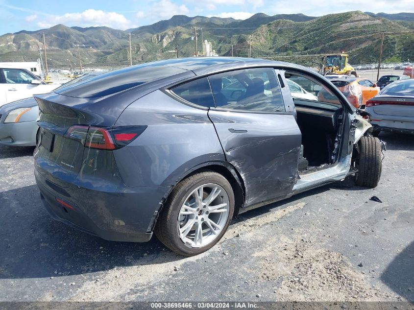 2023 Tesla Model Y Awd/Long Range Dual Motor All-Wheel Drive VIN: 7SAYGDEE5PF913765 Lot: 38695466