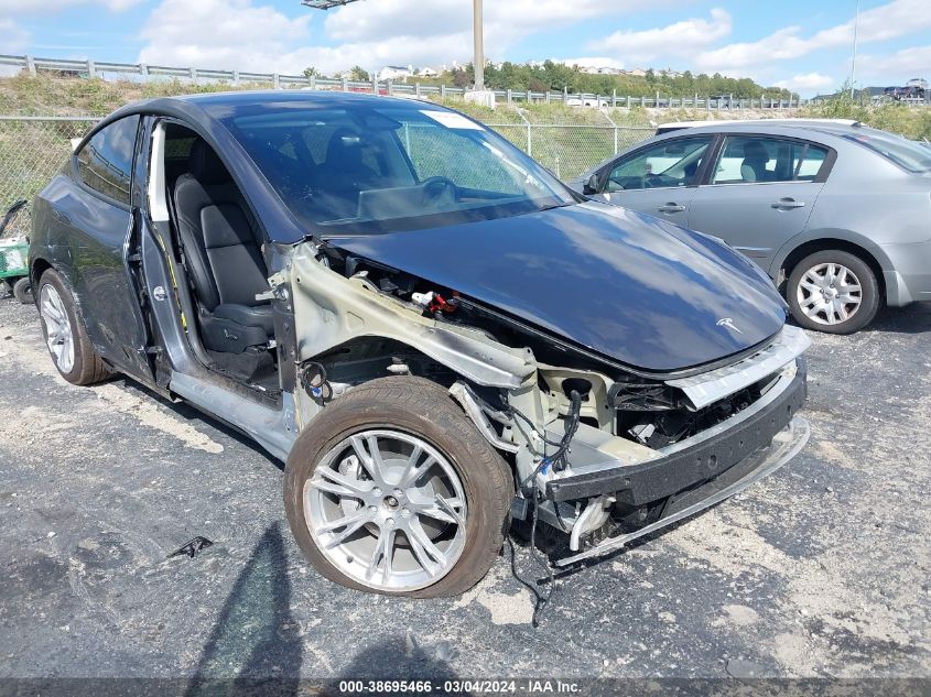 2023 Tesla Model Y Awd/Long Range Dual Motor All-Wheel Drive VIN: 7SAYGDEE5PF913765 Lot: 38695466