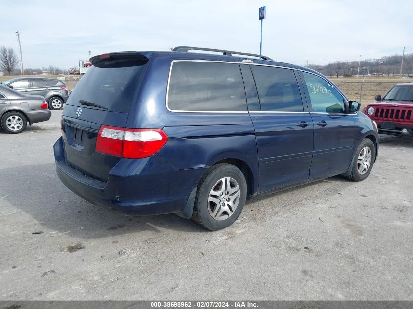 2007 Honda Odyssey Ex-L VIN: 5FNRL386X7B014587 Lot: 38698962