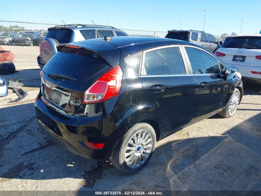 2016 Ford Fiesta Titanium VIN: 3FADP4FJ7GM174911 Lot: 38732078