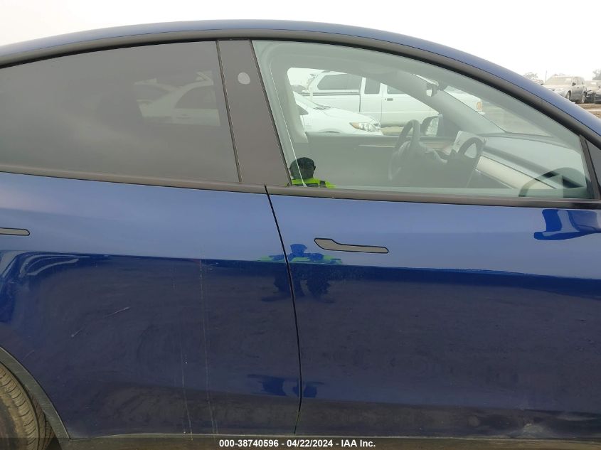 2023 Tesla Model Y Awd/Long Range Dual Motor All-Wheel Drive VIN: 7SAYGDEE4PF858516 Lot: 38740596