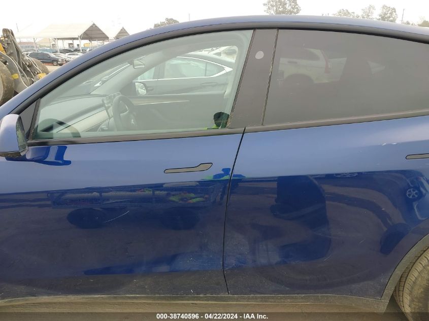 2023 Tesla Model Y Awd/Long Range Dual Motor All-Wheel Drive VIN: 7SAYGDEE4PF858516 Lot: 38740596