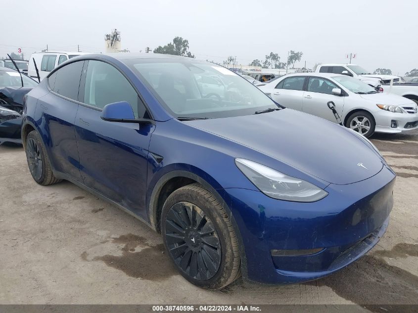 2023 Tesla Model Y Awd/Long Range Dual Motor All-Wheel Drive VIN: 7SAYGDEE4PF858516 Lot: 38740596