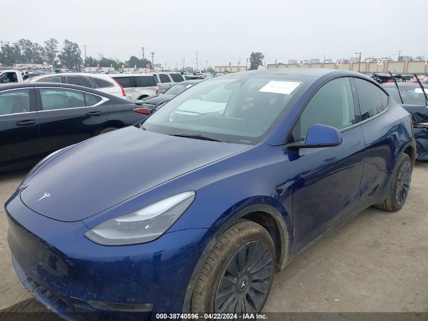 2023 Tesla Model Y Awd/Long Range Dual Motor All-Wheel Drive VIN: 7SAYGDEE4PF858516 Lot: 38740596