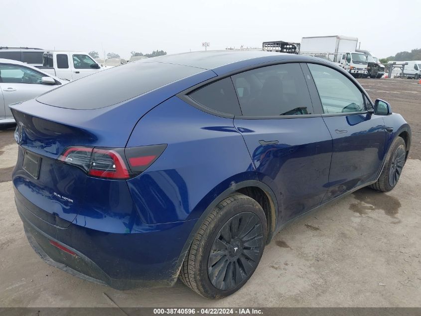 2023 Tesla Model Y Awd/Long Range Dual Motor All-Wheel Drive VIN: 7SAYGDEE4PF858516 Lot: 38740596
