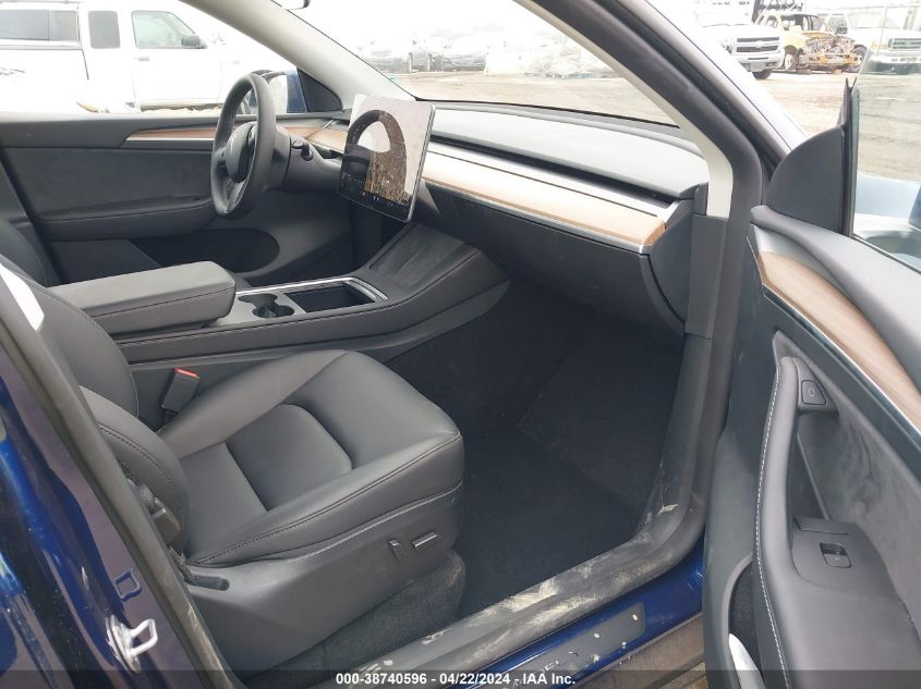 2023 Tesla Model Y Awd/Long Range Dual Motor All-Wheel Drive VIN: 7SAYGDEE4PF858516 Lot: 38740596