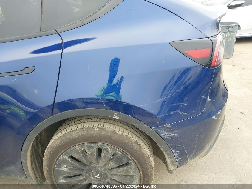 2023 Tesla Model Y Awd/Long Range Dual Motor All-Wheel Drive VIN: 7SAYGDEE4PF858516 Lot: 38740596