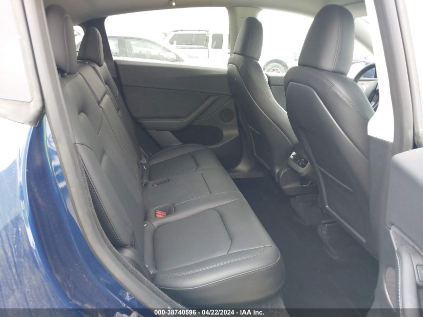 2023 Tesla Model Y Awd/Long Range Dual Motor All-Wheel Drive VIN: 7SAYGDEE4PF858516 Lot: 38740596