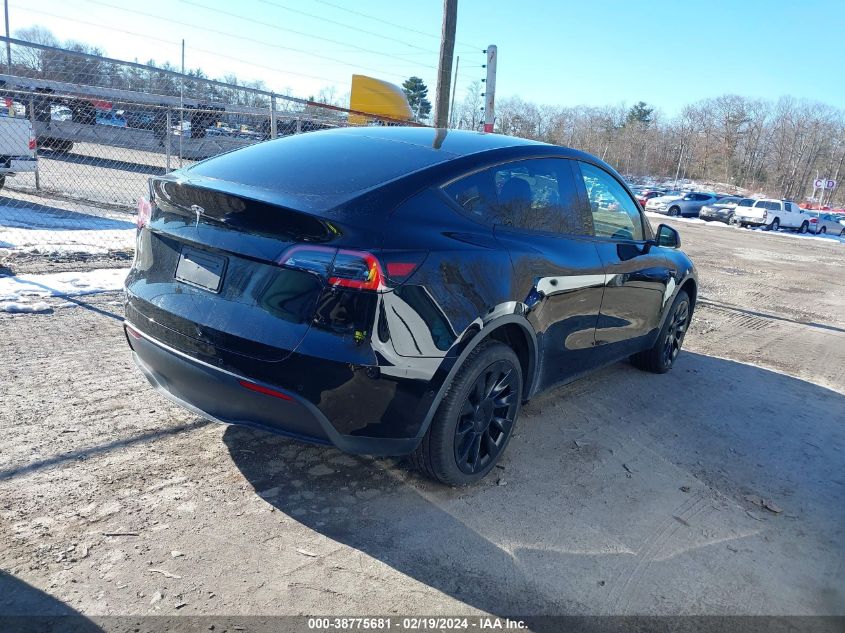 2021 Tesla Model Y Standard Range Rear-Wheel Drive VIN: 5YJYGDED3MF108962 Lot: 38775681