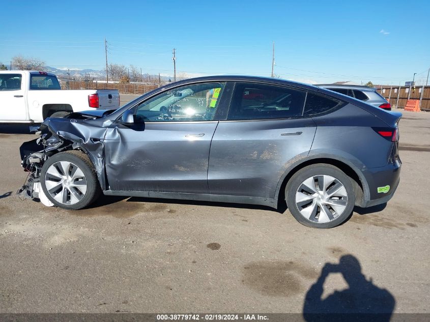 2023 Tesla Model Y Awd/Long Range Dual Motor All-Wheel Drive VIN: 7SAYGDEEXPF638460 Lot: 38779742