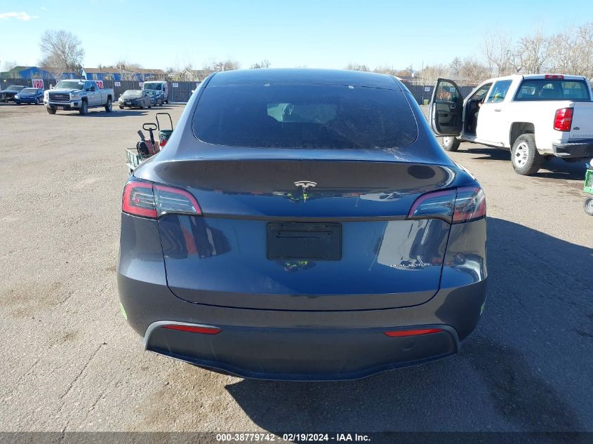 2023 Tesla Model Y Awd/Long Range Dual Motor All-Wheel Drive VIN: 7SAYGDEEXPF638460 Lot: 38779742