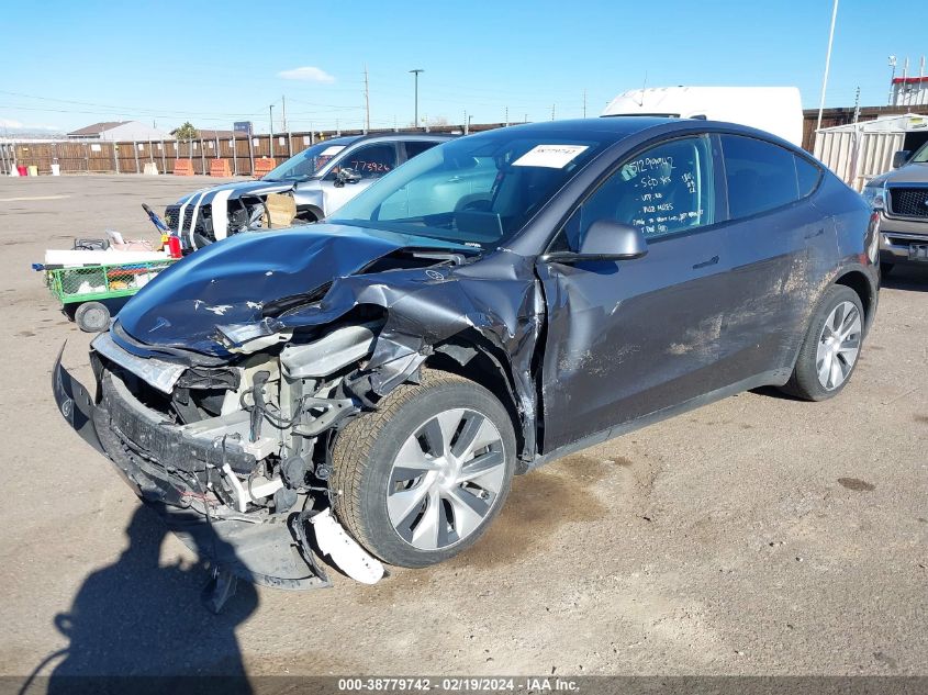 2023 Tesla Model Y Awd/Long Range Dual Motor All-Wheel Drive VIN: 7SAYGDEEXPF638460 Lot: 38779742