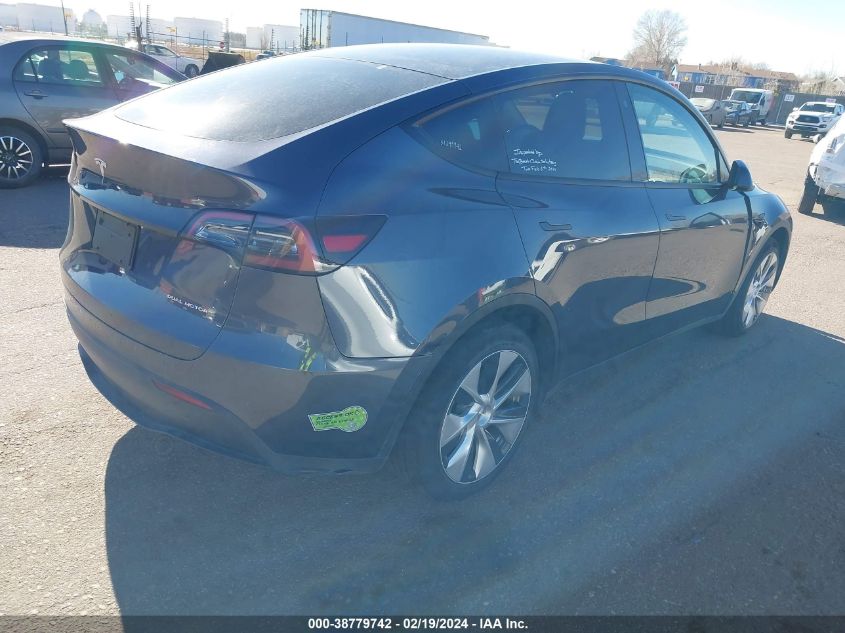 2023 Tesla Model Y Awd/Long Range Dual Motor All-Wheel Drive VIN: 7SAYGDEEXPF638460 Lot: 38779742