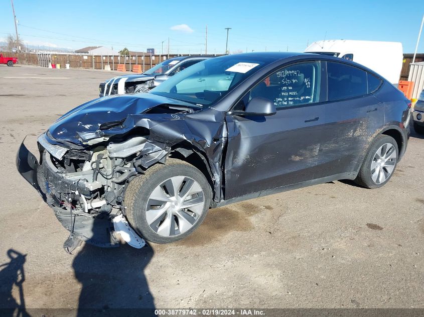 2023 Tesla Model Y Awd/Long Range Dual Motor All-Wheel Drive VIN: 7SAYGDEEXPF638460 Lot: 38779742