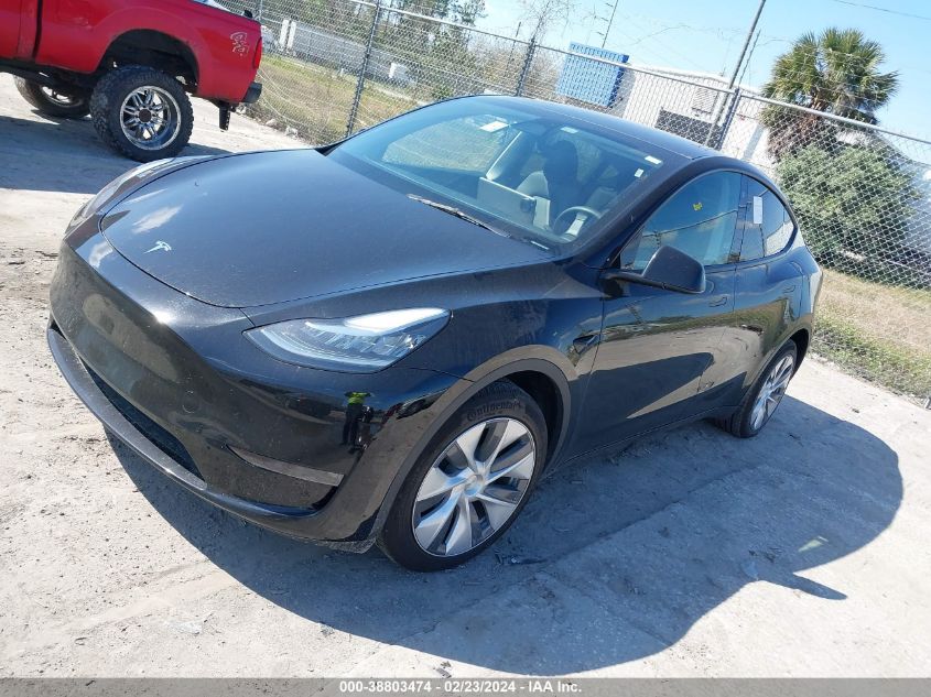 2023 Tesla Model Y Awd/Long Range Dual Motor All-Wheel Drive VIN: 7SAYGDEE2PA044863 Lot: 38803474