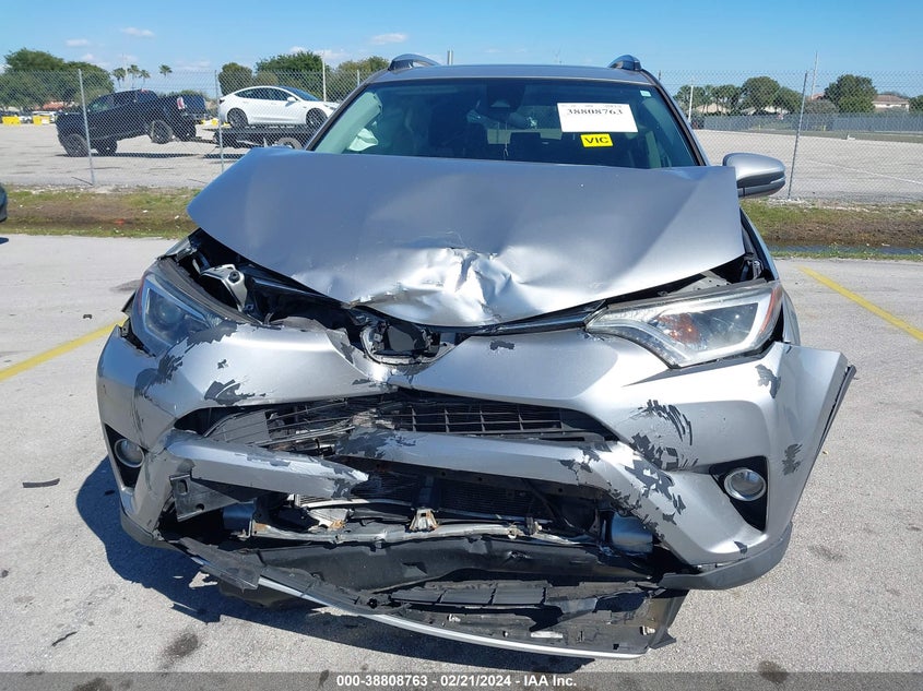 VIN JTMWFREV0JJ203693 2018 TOYOTA RAV4 XLE