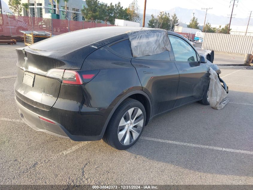 VIN 7SAYGDEE7PA142402 2023 Tesla Model Y, Awd/Long... no.4