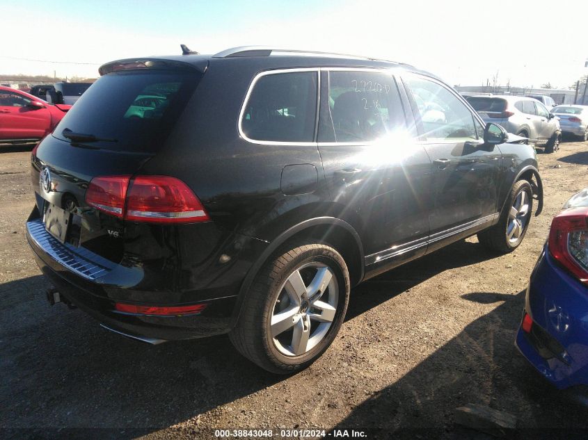 2014 Volkswagen Touareg 3.6L Lux VIN: WVGEF9BP7ED012421 Lot: 38843048