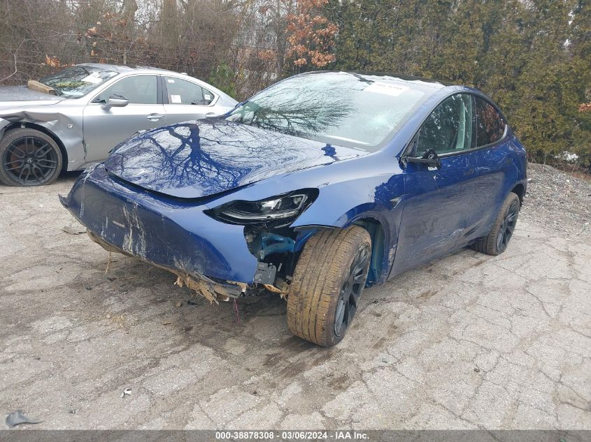 2023 Tesla Model Y Awd/Long Range Dual Motor All-Wheel Drive VIN: 7SAYGDEE4PA185739 Lot: 38878308