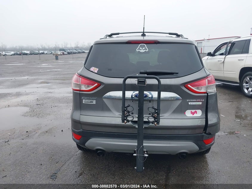 2014 Ford Escape Titanium VIN: 1FMCU0J97EUB39424 Lot: 38882570