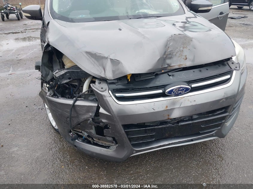 2014 Ford Escape Titanium VIN: 1FMCU0J97EUB39424 Lot: 38882570