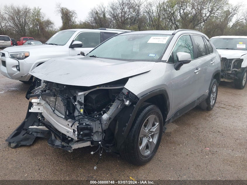 VIN 4T3RWRFV9PU090056 2023 TOYOTA RAV4 XLE HYBRID