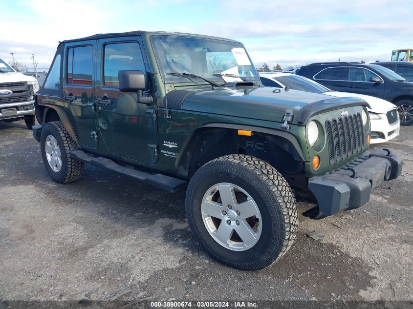 2007 Jeep Wrangler Unlimited Sahara VIN: 1J4GA59197L161289 Lot: 38900674