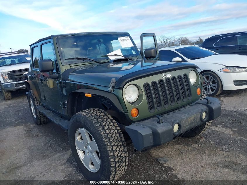 2007 Jeep Wrangler Unlimited Sahara VIN: 1J4GA59197L161289 Lot: 38900674