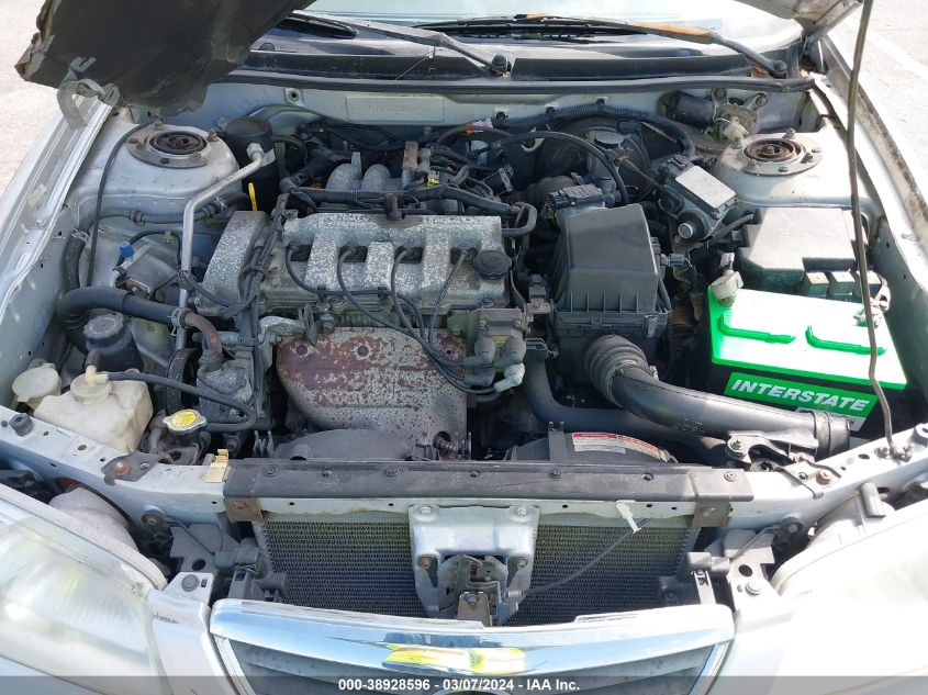 2001 Mazda 626 Es/Lx VIN: 1YVGF22C115242830 Lot: 38928596