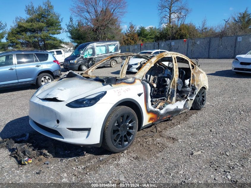 2023 Tesla Model Y VIN: 7SAYGAEE0PF59125 Lot: 38945045