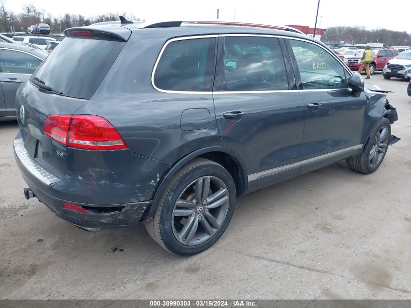 2014 Volkswagen Touareg 3.6L Lux VIN: WVGEF9BP4ED006799 Lot: 38990303