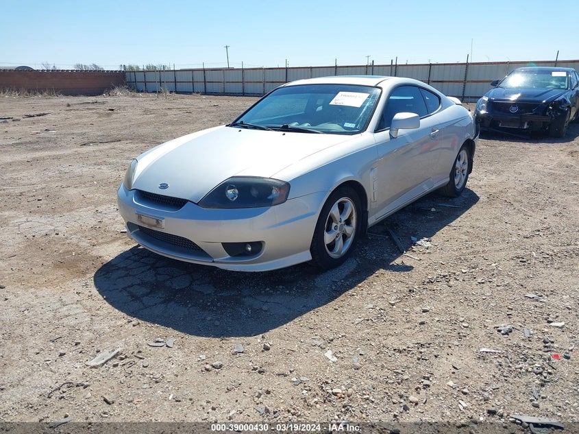 2006 Hyundai Tiburon Gs VIN: KMHHM65DX6U194863 Lot: 39000430