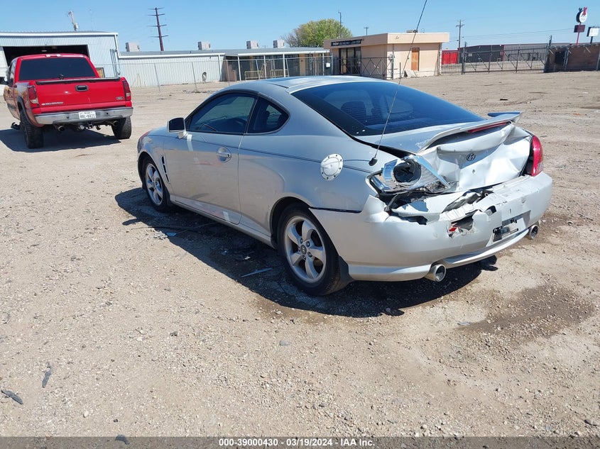 2006 Hyundai Tiburon Gs VIN: KMHHM65DX6U194863 Lot: 39000430
