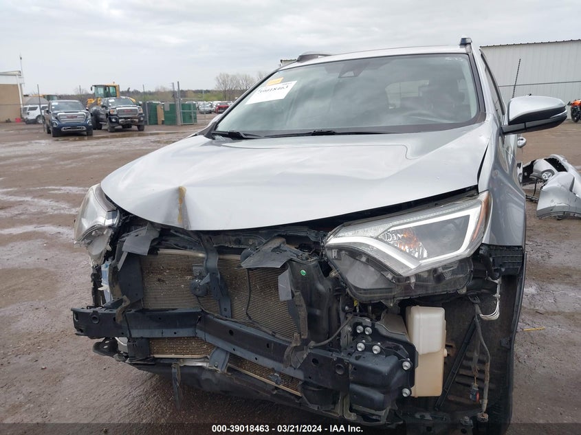 2018 TOYOTA RAV4 XLE - JTMWFREV0JD124667
