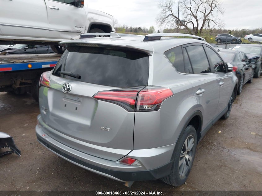 2018 TOYOTA RAV4 XLE - JTMWFREV0JD124667
