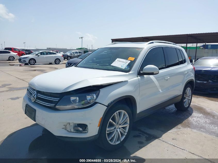 2014 Volkswagen Tiguan Sel VIN: WVGAV3AXXEW561728 Lot: 40739668