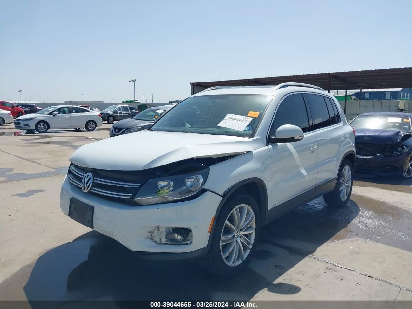 2014 Volkswagen Tiguan Sel VIN: WVGAV3AXXEW561728 Lot: 40739668