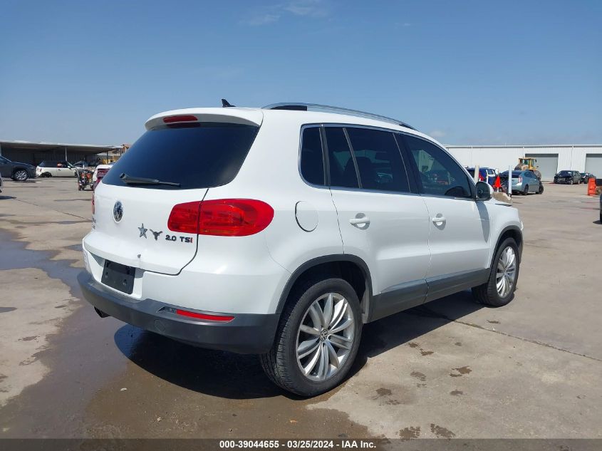 2014 Volkswagen Tiguan Sel VIN: WVGAV3AXXEW561728 Lot: 40739668