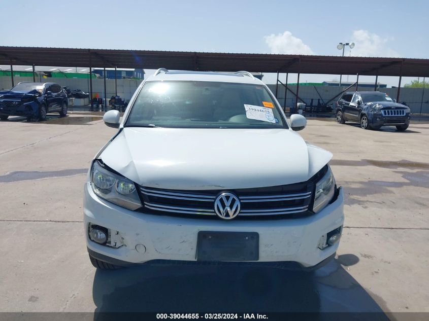 2014 Volkswagen Tiguan Sel VIN: WVGAV3AXXEW561728 Lot: 40739668