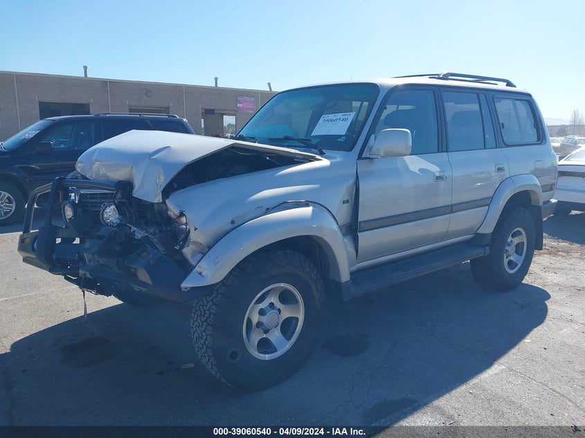 1997 Toyota Land Cruiser VIN: JT3HJ85JXV0185315 Lot: 39060540