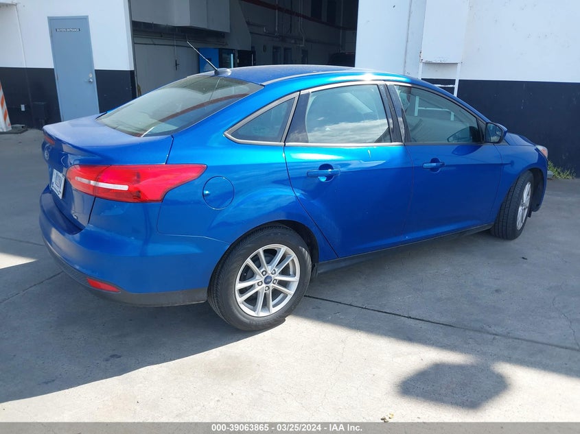 VIN 1FADP3F25JL328608 2018 FORD FOCUS SE