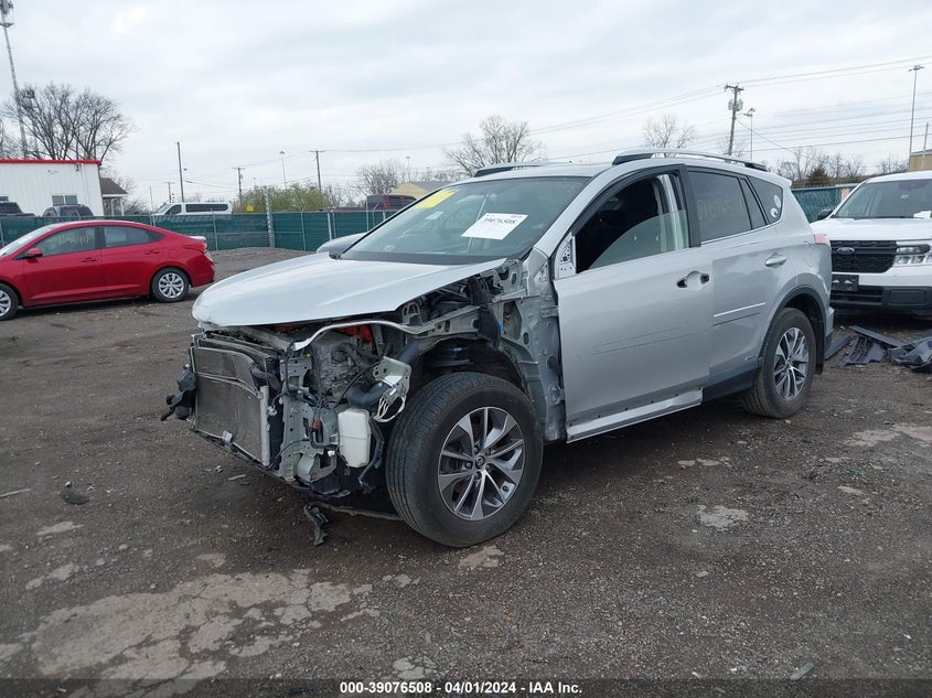2016 TOYOTA RAV4 HYBRID XLE - JTMRJREV6GD024934