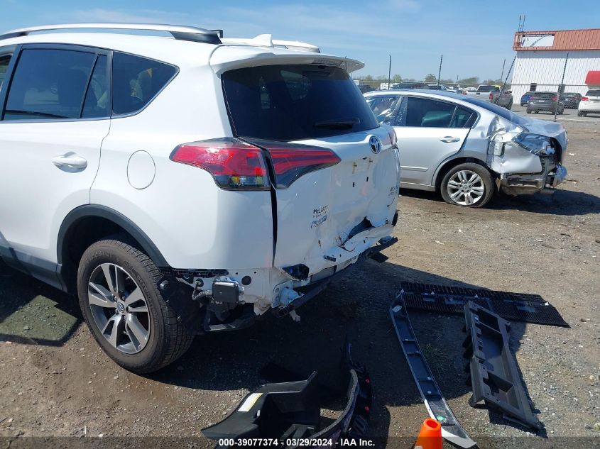 2018 Toyota Rav4 Xle VIN: 2T3RFREV6JW703954 Lot: 39077374