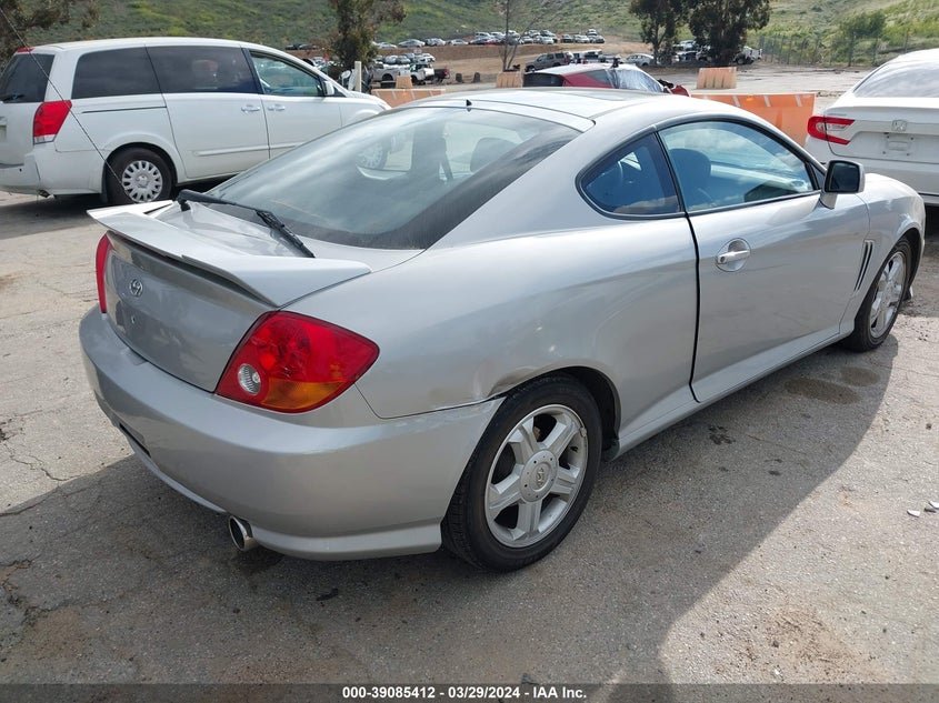 2003 Hyundai Tiburon VIN: KMHHM65D43U087903 Lot: 39085412