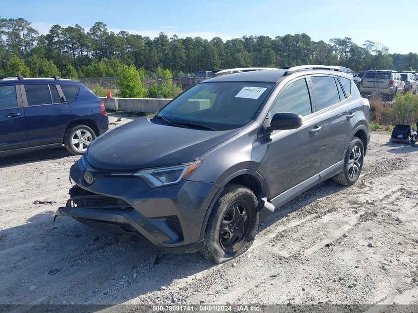 VIN JTMZFREV5JJ742145 2018 TOYOTA RAV4 LE