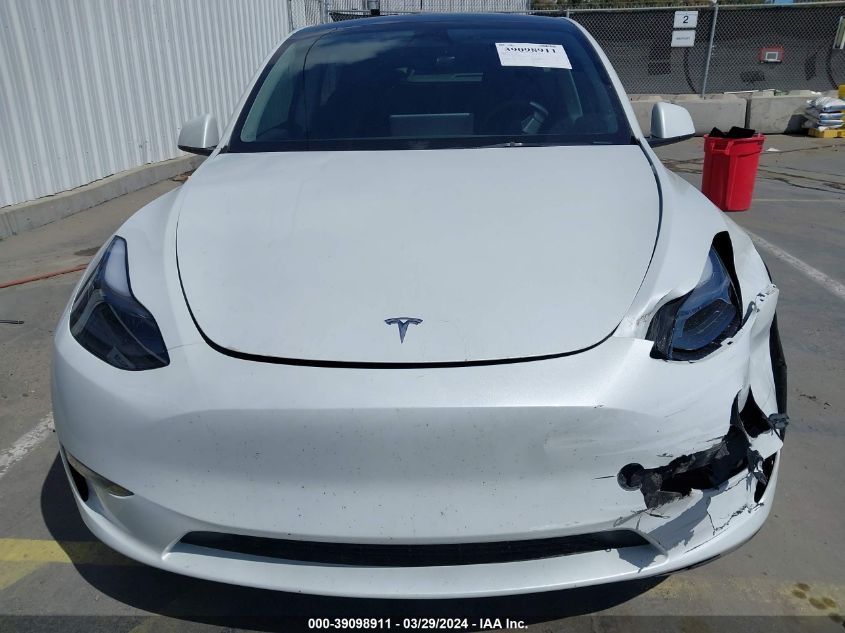 2023 Tesla Model Y Awd/Long Range Dual Motor All-Wheel Drive VIN: 7SAYGAEE4PF624651 Lot: 39098911