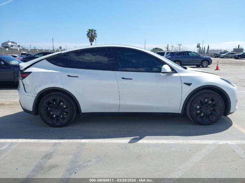 2023 Tesla Model Y Awd/Long Range Dual Motor All-Wheel Drive VIN: 7SAYGAEE4PF624651 Lot: 39098911