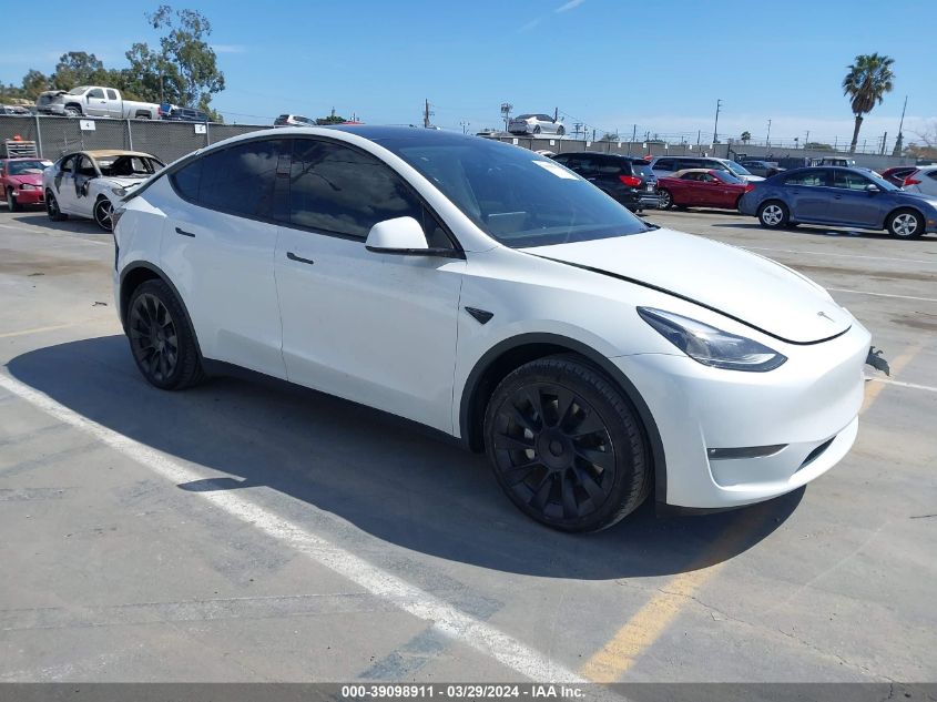 2023 Tesla Model Y Awd/Long Range Dual Motor All-Wheel Drive VIN: 7SAYGAEE4PF624651 Lot: 39098911