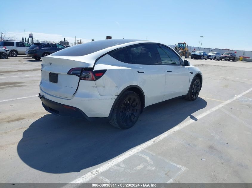 2023 Tesla Model Y Awd/Long Range Dual Motor All-Wheel Drive VIN: 7SAYGAEE4PF624651 Lot: 39098911